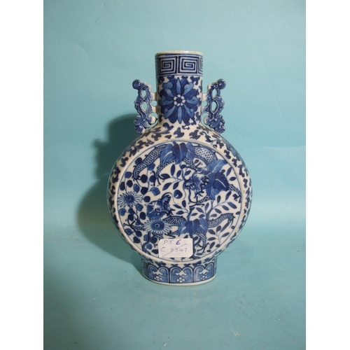 218 - A 19th century Chinese blue and white 'Dragon' moon flask, (slight bruise to rim), 26cm high.... 