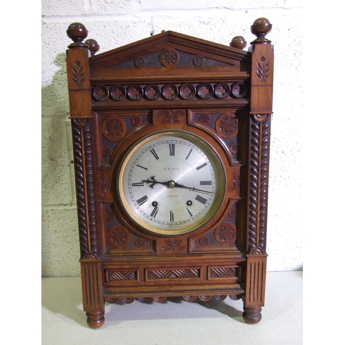 50 - B W Nix, Exeter, a late-19th/early-20th century walnut bracket clock in the Aesthetic taste, with tw... 