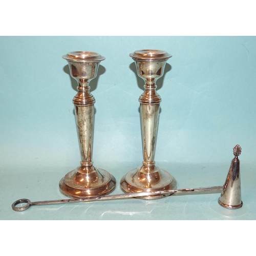 577 - A pair of modern silver candlesticks with loaded bases, 19cm high, Birmingham 1963 and a modern silv... 