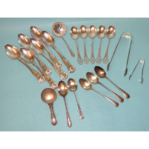 578 - Six Georgian silver teaspoons and a pair of sugar tongs, various dates, a Victorian silver caddy spo... 