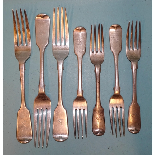 580 - Three Victorian silver table forks, Exeter 1857, maker WP, together with four silver dessert forks, ... 