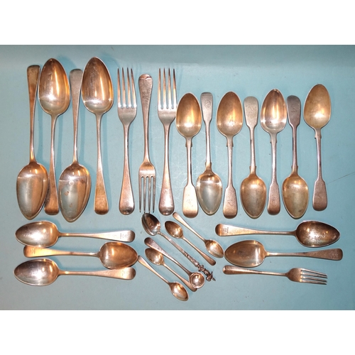 581 - A quantity of 19th century silver flatware, including four tablespoons, twelve dessert spoons, three... 