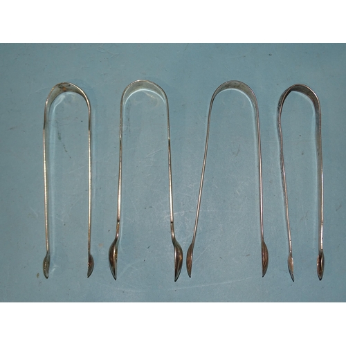 584 - Two pairs of Georgian bright-cut silver sugar tongs and two others, various dates, ___5oz, (4).... 