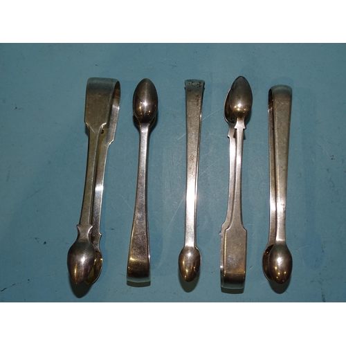 585 - Five pairs of Georgian plain silver sugar tongs, various dates, ___6oz.