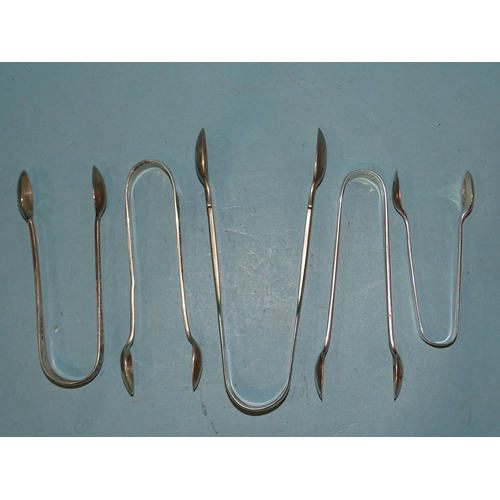 586 - Five pairs of Victorian silver sugar tongs, various dates, ___4.8oz.