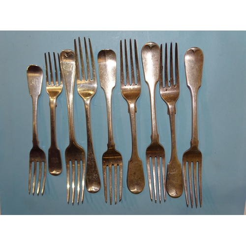 591 - Four George IV silver fiddle pattern table forks, London 1829, maker William Chawner II, three other... 