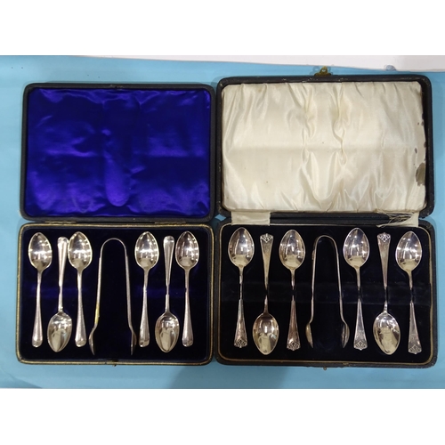 601 - A cased set of six silver teaspoons and sugar tongs, Birmingham 1918, monogrammed, and another cased... 