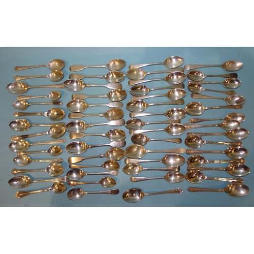 604 - A large collection of silver teaspoons, various dates and makers, ___35oz.