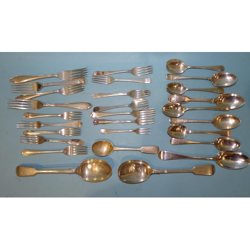 605 - A pair of silver fiddle pattern tablespoons, Chester 1915, other silver spoons and forks, ___25oz, v... 