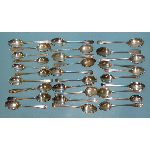 606 - A collection of silver coffee spoons, various dates and makers, ___10oz.