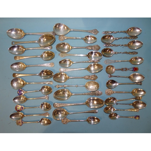 607 - A collection of silver decorative teaspoons, including one by Liberty & Co, Birmingham 1910, ___... 