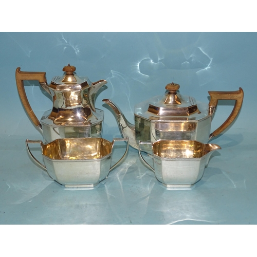 609 - A George V four-piece silver tea service of octagonal form, comprising teapot, hot water jug, sugar ... 