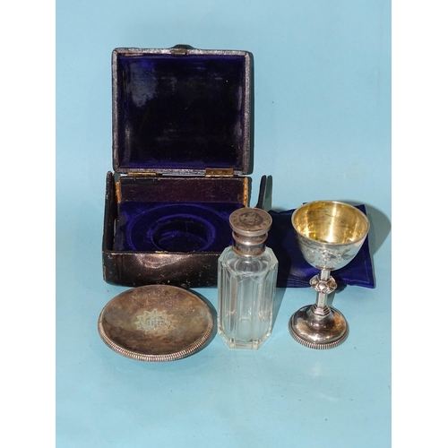 623 - A Victorian travelling communion set, comprising chalice with knopped stem, patten and holy water/co... 