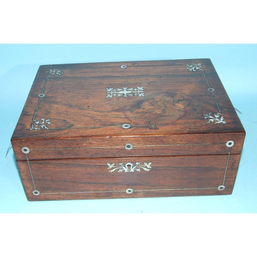 67 - An early-19th century rosewood and mother-of-pearl-inlaid sewing box, the fitted interior with some ... 