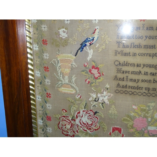 70 - A large mid-Victorian needlework sampler worked a morbid rhyme surrounded by sprays of flowers, bird... 