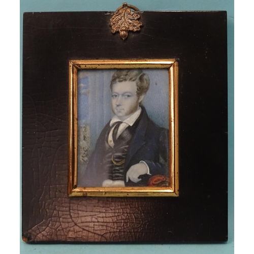 86 - A late-19th century miniature portrait of a young man in a waistcoat with gold chain, on ivory, (no ... 