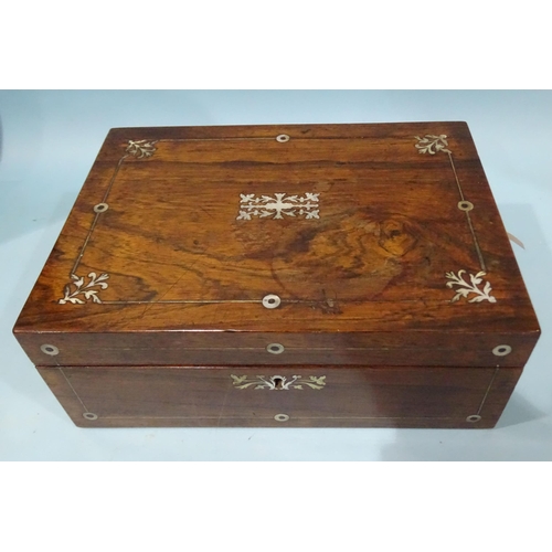 67 - An early-19th century rosewood and mother-of-pearl-inlaid sewing box, the fitted interior with some ... 