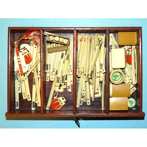 71 - A bone and bamboo Mah Jong set in metal-mounted wooden box, with separately-boxed wings.... 