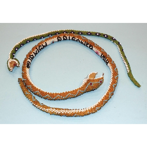 197 - A Turkish Prisoner of War beaded snake dated 1914?, 67cm long and an unmarked smaller beaded snake, ... 