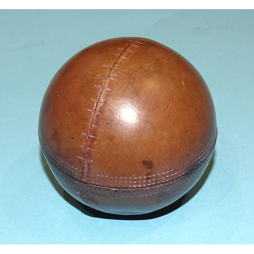 198 - A vintage leather cricket ball novelty inkwell, the hinged top opening to reveal a plated dome top a... 