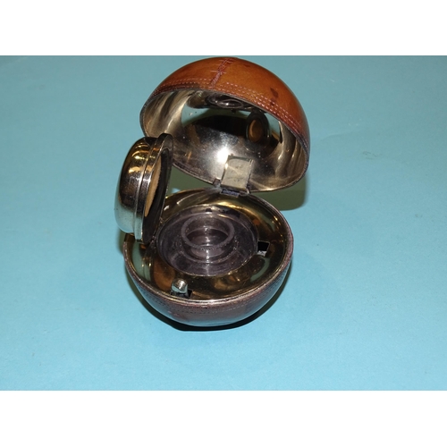 198 - A vintage leather cricket ball novelty inkwell, the hinged top opening to reveal a plated dome top a... 