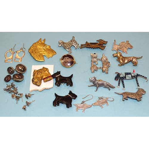 206 - A quantity of vintage and modern brooches and earrings, etc, mainly in the form of dogs, including a... 