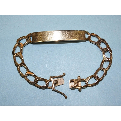 239 - A gold identity bracelet with curb links, marked '14k', 18.5cm, 26g.