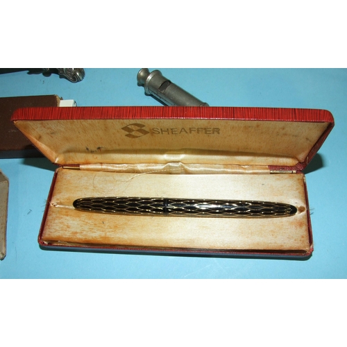 118 - A Lady Sheaffer fountain pen in box and outer case, a plated toast rack, an Emca Boy Scout whistle, ... 