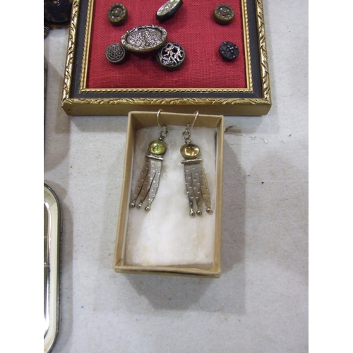 120 - A collection of vintage glass and metal buttons, a pair of .925-silver drop earrings, lead farmyard ... 