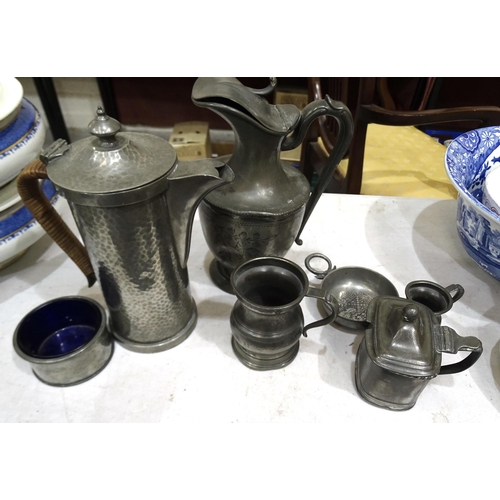 53 - Two large pewter chargers with London touch marks, 52cm diameter, three smaller dishes and other sma... 