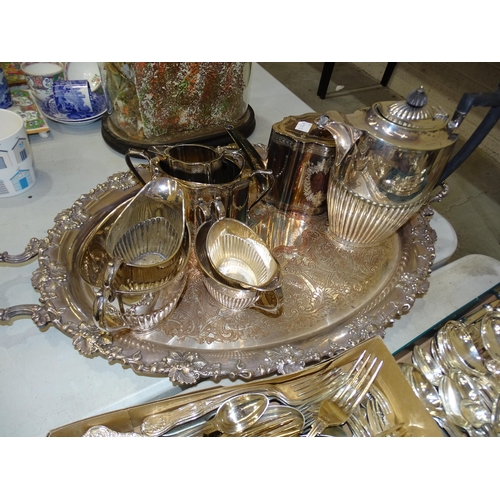 60 - Various plated tea services, a spirit kettle and a collection of plated king's pattern flatware.... 