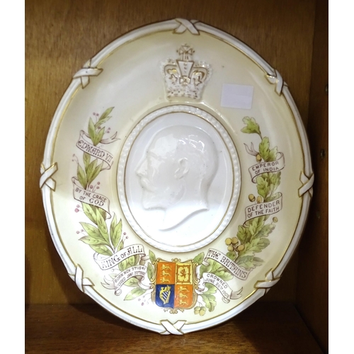 78 - An oval commemorative plaque depicting Edward VII, 26 x 22cm, a Queen Victoria jubilee ring, a Dame ... 