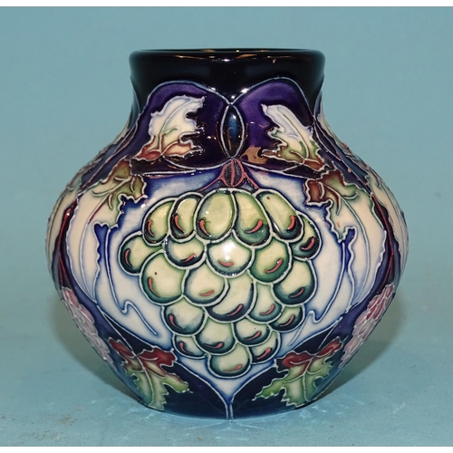 91 - A small modern Moorcroft ceramic pot of baluster shape, line-decorated with grapes and vines, painte... 