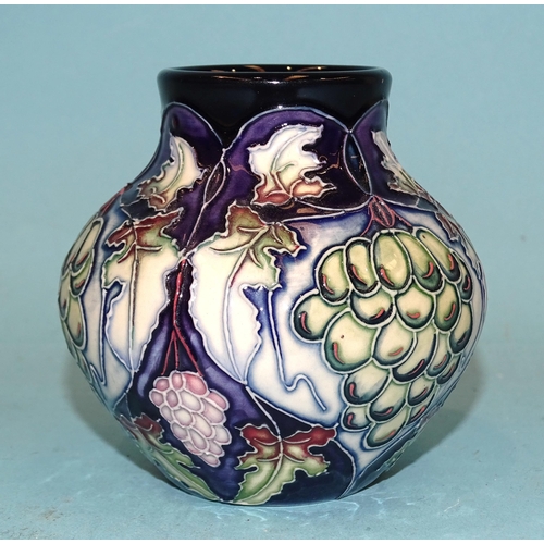 91 - A small modern Moorcroft ceramic pot of baluster shape, line-decorated with grapes and vines, painte... 