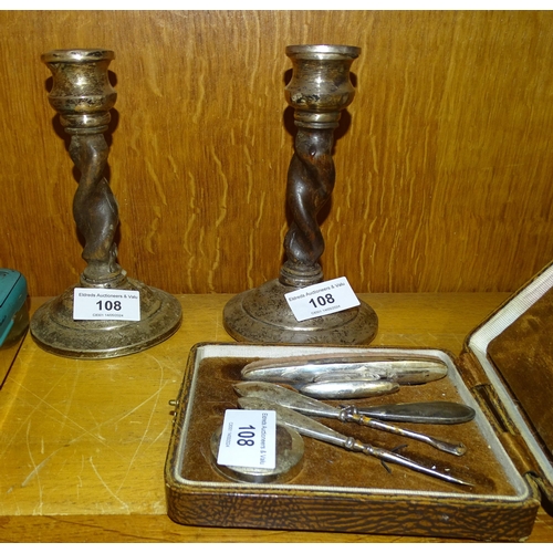 108 - A small pair of oak twist candlesticks with silver tops and bases, 16.5cm high (a/f), a silver-mount... 