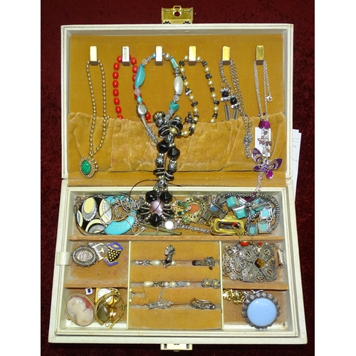 113 - A quantity of costume jewellery in a large jewellery box.