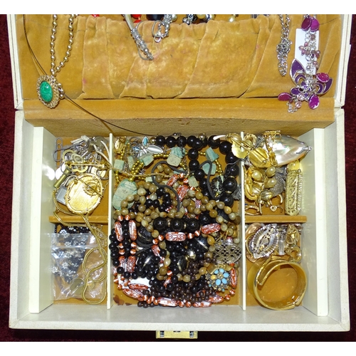 113 - A quantity of costume jewellery in a large jewellery box.