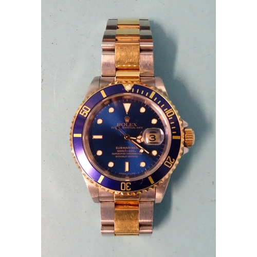 290 - Rolex, a bi-metal Submariner Oyster Perpetual Date bracelet wrist watch ref: 16613, the blue dial wi... 