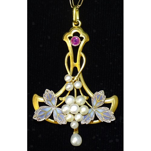 A French 18ct gold Art Nouveau pendant of sinuous form, collet-set a round-cut ruby above clusters of pearl 'grapes' between pale blue plique-à-jour vine leaves edged with rose-cut diamond points, with pearl drop below, on neck chain, indistinct gold marks to the bale loop and chain unsigned, 55 x 35mm, 13.7g.