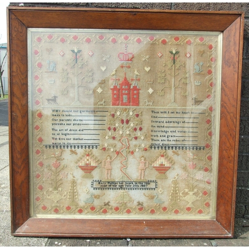 18 - A large Victorian needlework sampler, worked with a house, Adam and Eve, birds, animals and trees, w... 