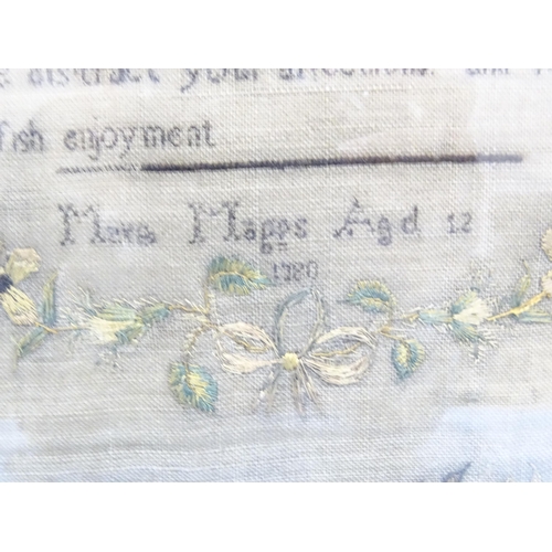 23 - A large 18th century sampler by Mare(?) Maggs aged 12, with prose within floral wreath and borders, ... 