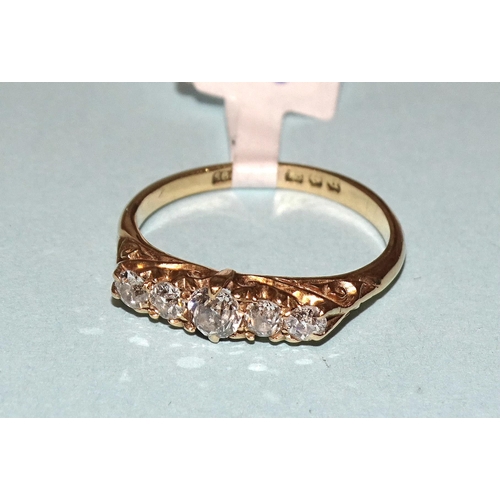 241 - A five-stone diamond ring claw-set graduated old brilliant-cut diamonds, in 18ct yellow gold mount, ... 