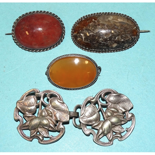 275 - Three silver-mounted hardstone brooches, a white metal Art Nouveau buckle, a Plymouth Competitive Mu... 