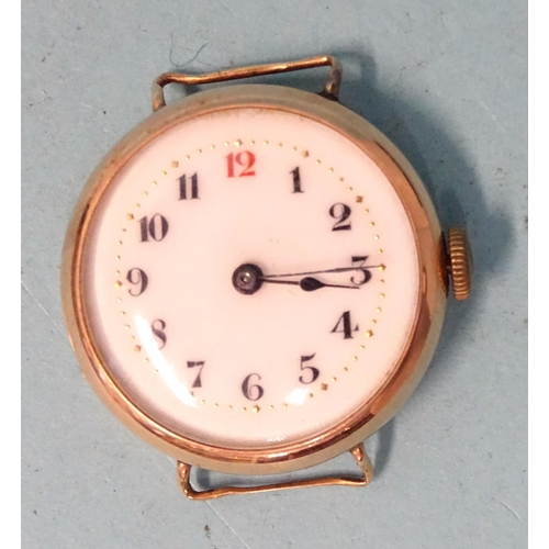 293 - A 9ct rose gold trench-style wrist watch, the white enamel dial with Arabic numerals, 26.5mm diamete... 