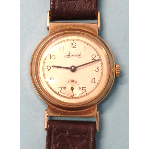 300 - Accurist, a 1940's 9ct-gold-cased 15-jewel wrist watch, the silvered dial with Arabic numerals and s... 