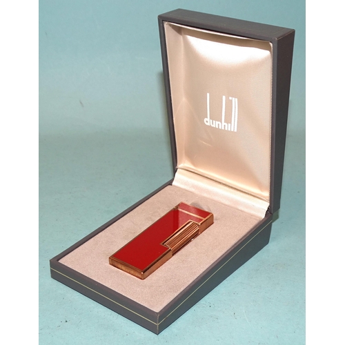 315 - A Dunhill gilt metal and red/brown Rollagas lighter, (boxed).