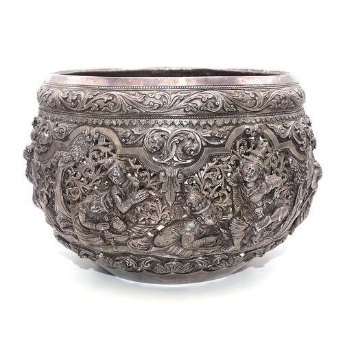 336 - A good-quality Burmese pierced bowl decorated in deep relief with a courting couple, other figures a... 