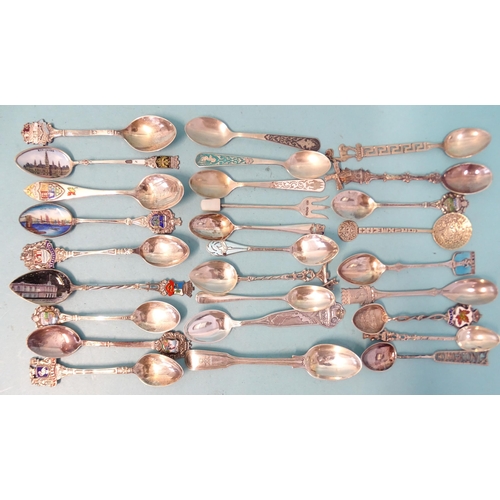 342 - A quantity of mainly foreign white metal souvenir spoons, etc, many enamelled, gross weight ___10oz.... 