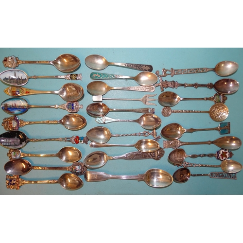 342 - A quantity of mainly foreign white metal souvenir spoons, etc, many enamelled, gross weight ___10oz.... 