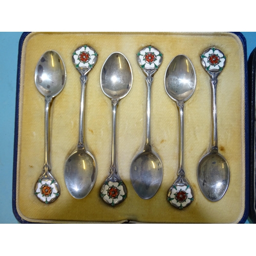 380 - A set of six silver coffee spoons with enamelled Tudor rose terminals by Mappin & Webb, Birmingh... 